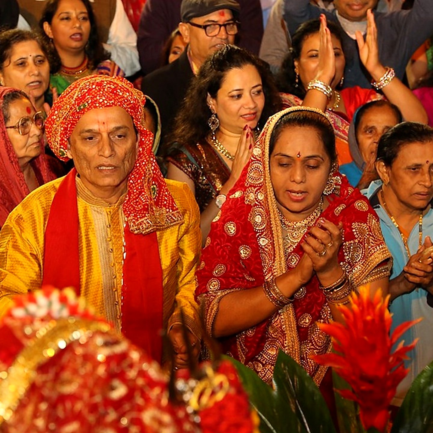 Couple performing aarti